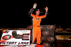 David Mayhew celebrating his NASCAR K&N Pro Series victory at Stockton 150